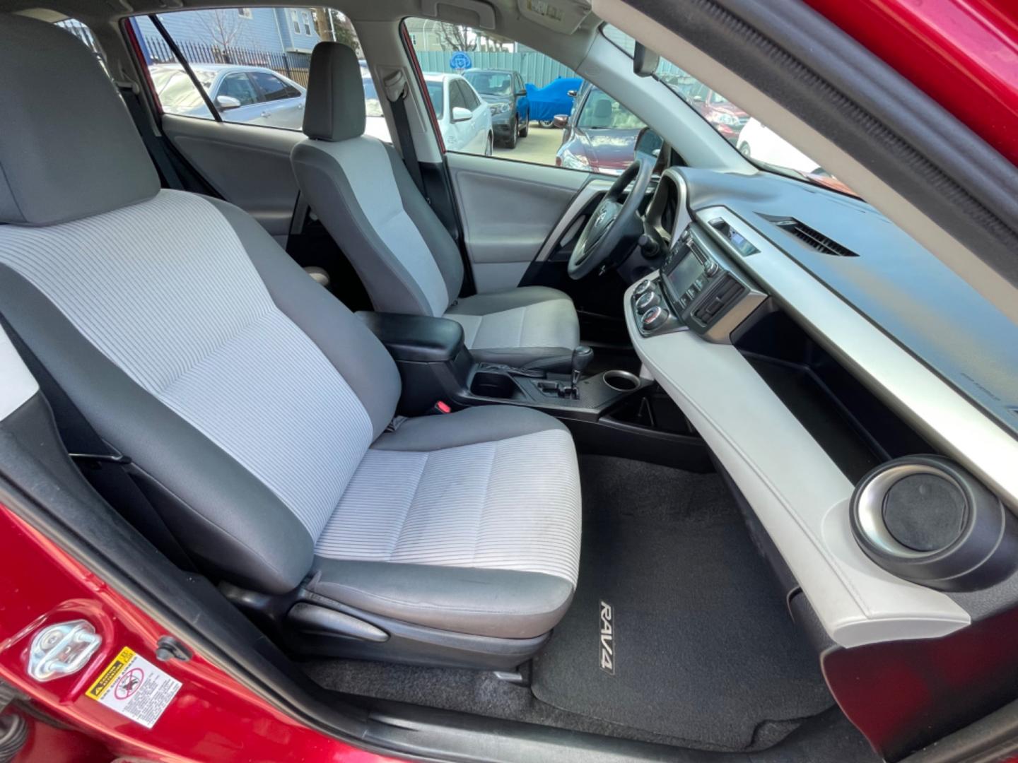 2013 Red /Silver Toyota RAV4 LE (2T3ZFREV0DW) with an 2.5L engine, Automatic transmission, located at 1501 West 15th St., Houston, 77008, (713) 869-2925, 29.797941, -95.411789 - Photo#6